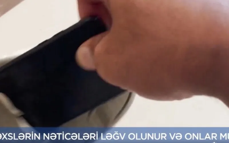 DİM: İştirakçı mobil telefonunu ayaqqabısının altında gizlətməyə cəhd göstərib