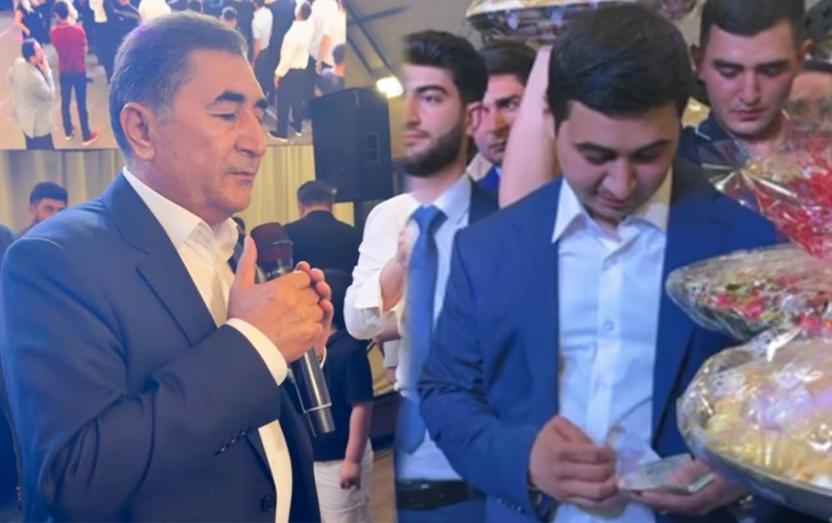Toyunda oxuyan atasına nəmər verdi