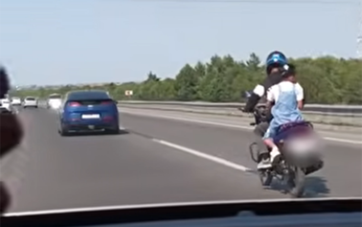 Övladını təhlükəli vəziyyətdə motosikletlə apardı - Saxlanıldı - VİDEO